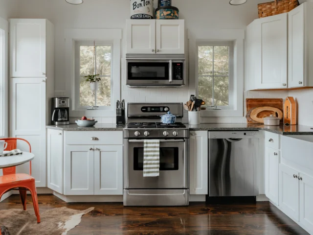 Kitchen with white cabinets and stainless steel appliances