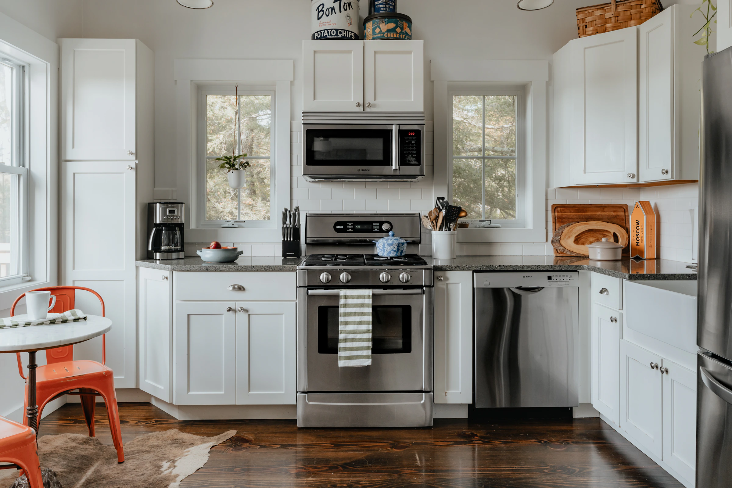 Kitchen with white cabinets and stainless steel appliances